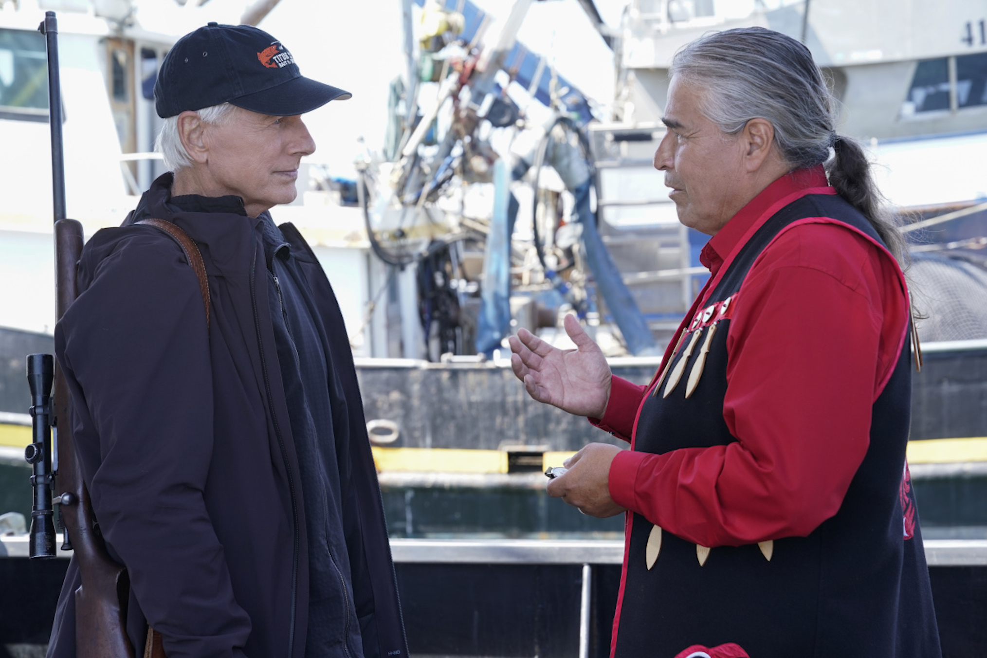 Mark Harmon as Gibbs, Wayne Charles Baker as Tunu in NCIS